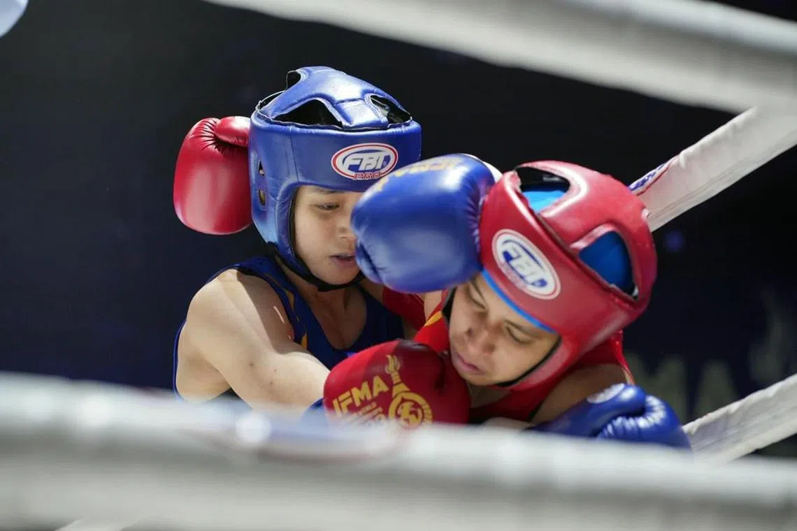 National Muay Thai exponent Cheryl Gwa in action against Thailand's Apichaya Lekmat in the senior female elite under-48kg final at the May 4-13 IFMA World Championships in Bangkok.