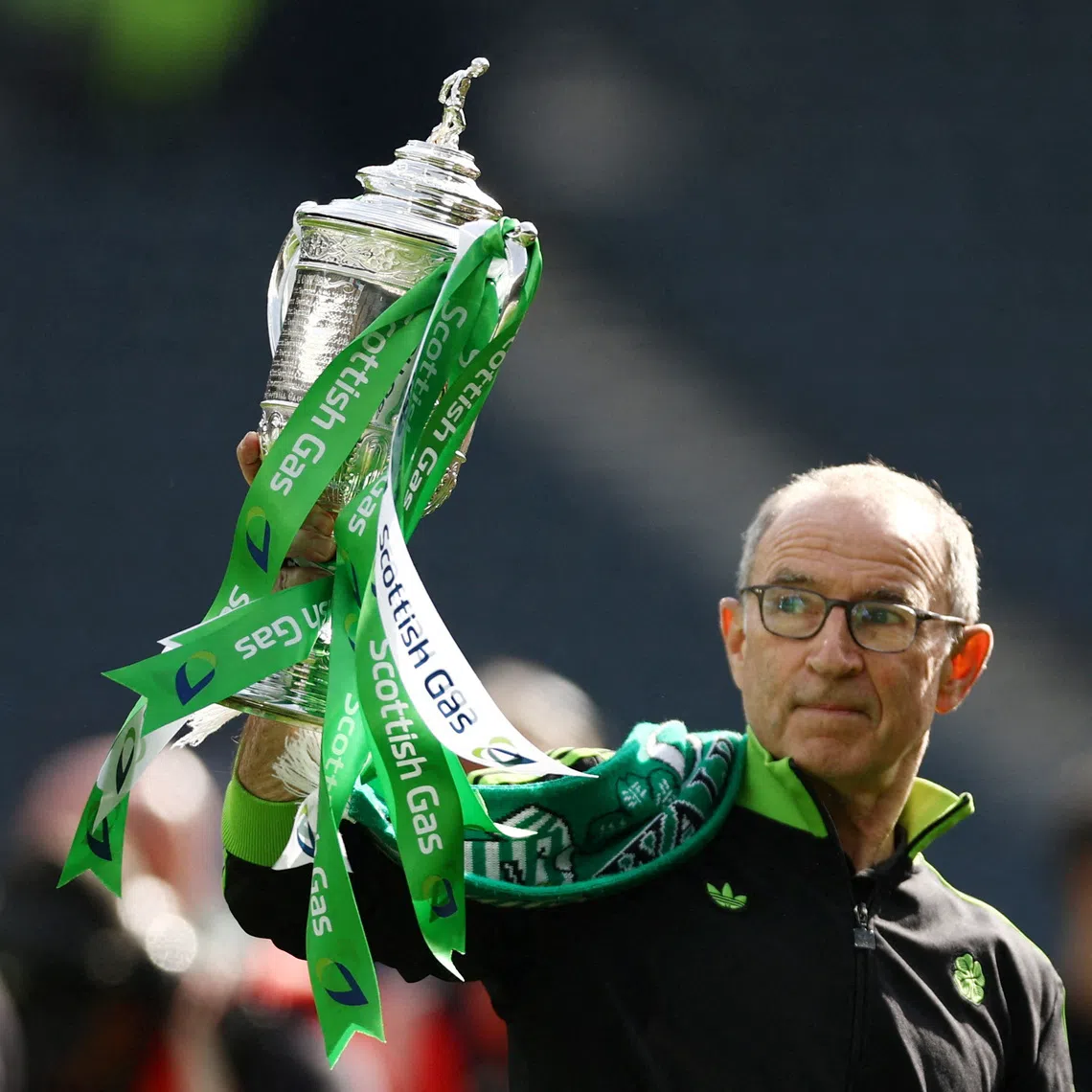 FILE PHOTO: Soccer Football - Scottish Cup - Final - Celtic v Dunfermline Athletic - Hampden Park, Glasgow, Scotland, Britain - May 23, 2026 Celtic manager Martin O'Neill celebrates with the trophy after winning the Scottish Cup Action Images via Reuters/Lee Smith/File Photo
