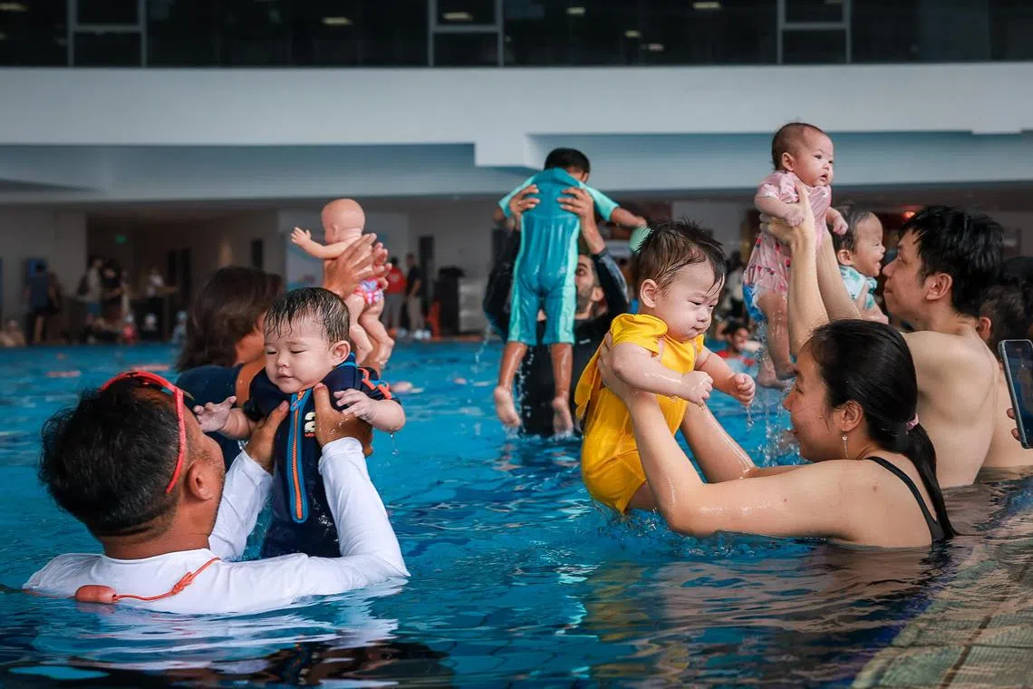 A SwimStart class being conducted at the launch of the new Swim Singapore framework held at Bedok ActiveSG Swimming Complex on July 5, 2025.