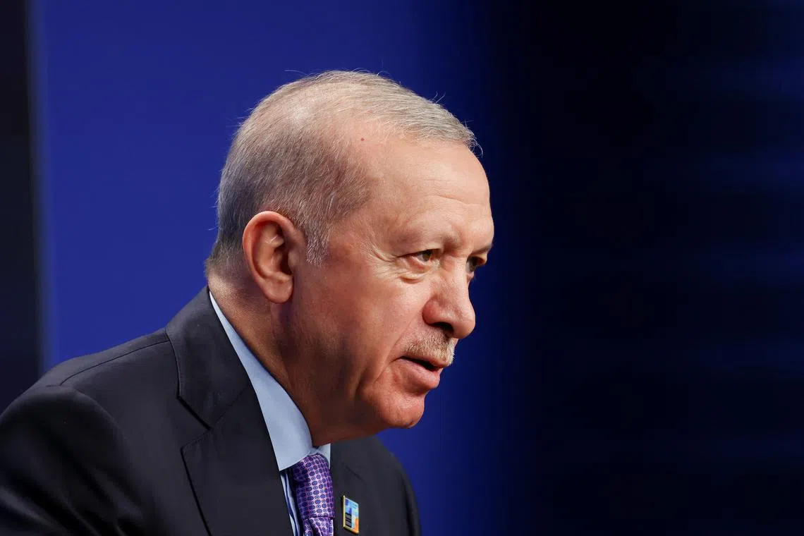 FILE PHOTO: Turkey's President Tayyip Erdogan holds a press conference at the NATO summit in The Hague, Netherlands June 25, 2025. REUTERS/Piroschka Van De Wouw/ File Photo