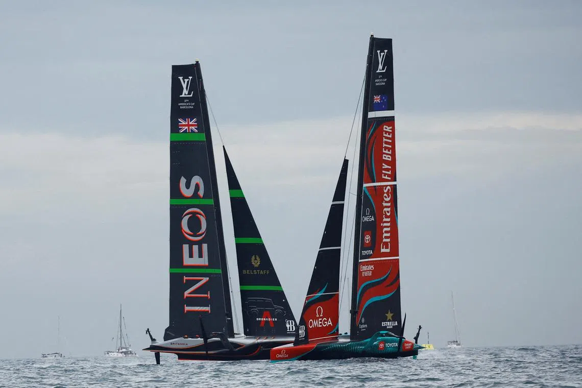 FILE PHOTO: Sailing - 37th America's Cup - New Zealand v Britain - Barcelona, Spain - October 12, 2024 Ineos Britannia and Emirates Team New Zealand in action during race 2 of the match REUTERS/Albert Gea/File Photo