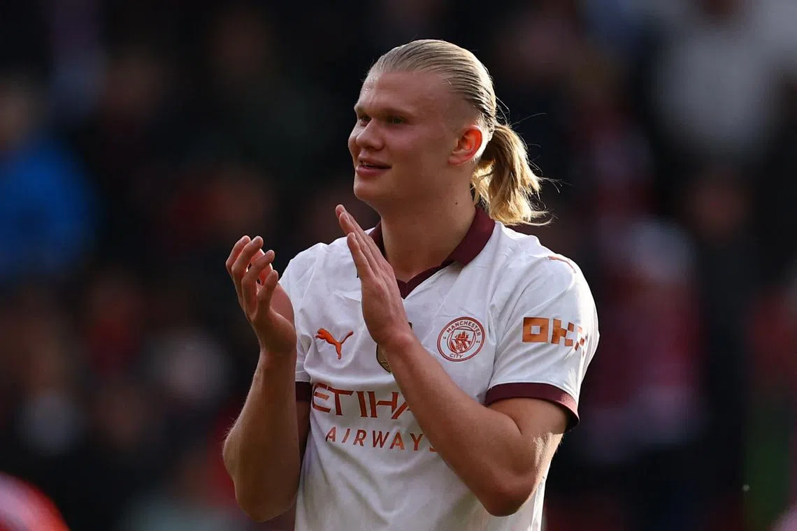 Soccer Football - Premier League - Nottingham Forest v Manchester City - The City Ground, Nottingham, Britain - April 28, 2024 Manchester City's Erling Braut Haaland applauds fans after the match REUTERS/Molly Darlington NO USE WITH UNAUTHORIZED AUDIO, VIDEO, DATA, FIXTURE LISTS, CLUB/LEAGUE LOGOS OR 'LIVE' SERVICES. ONLINE IN-MATCH USE LIMITED TO 45 IMAGES, NO VIDEO EMULATION. NO USE IN BETTING, GAMES OR SINGLE CLUB/LEAGUE/PLAYER PUBLICATIONS.