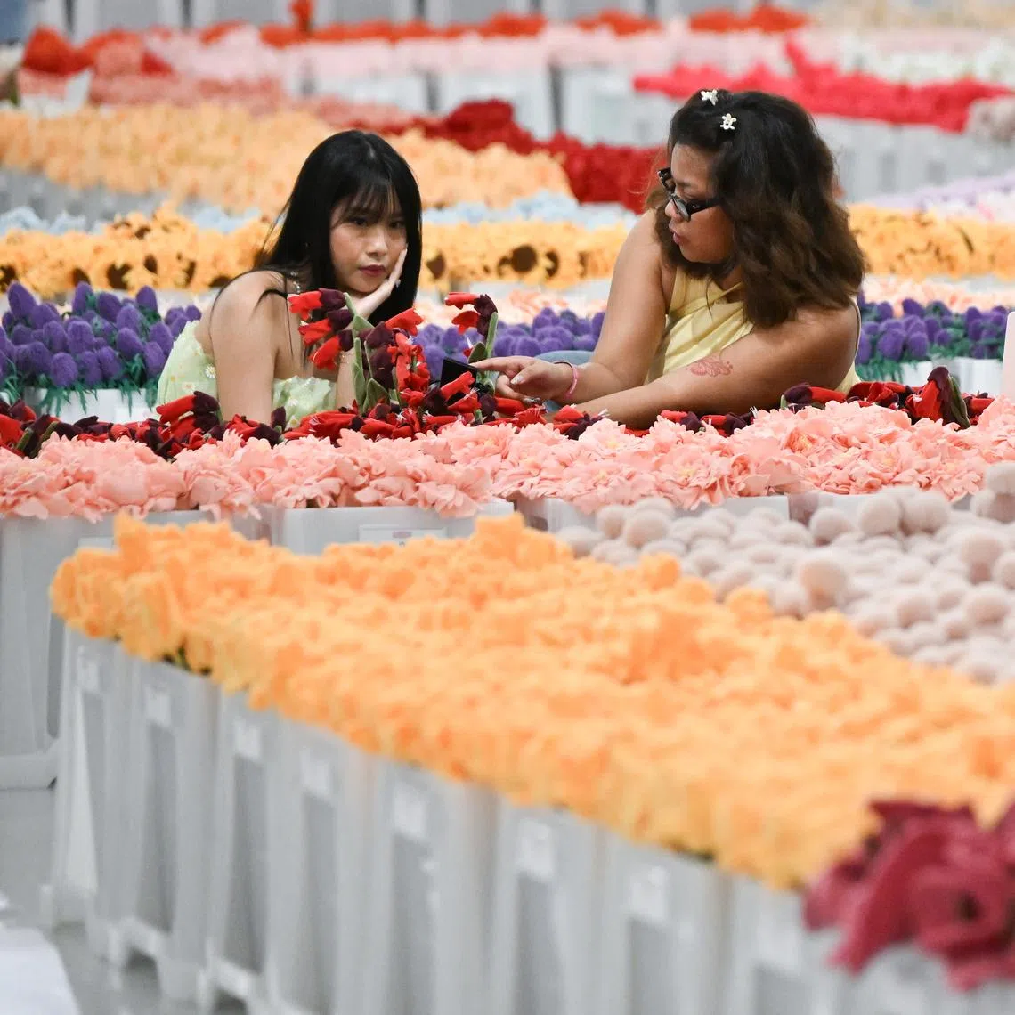There are no plans to limit the number of flowers visitors can purchase at Australian artist Cj Hendry's Flower Market at Gardens by the Bay.