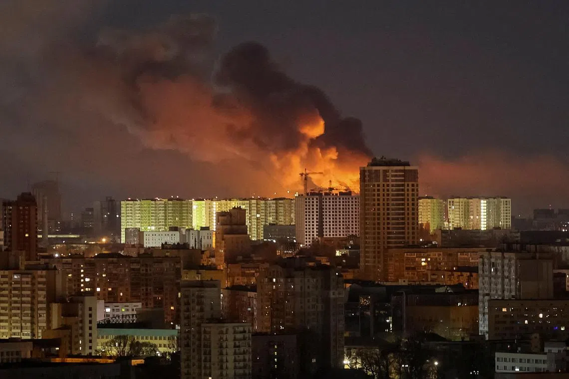 Smoke rises in the sky over Kyiv after a Russian drone strike.