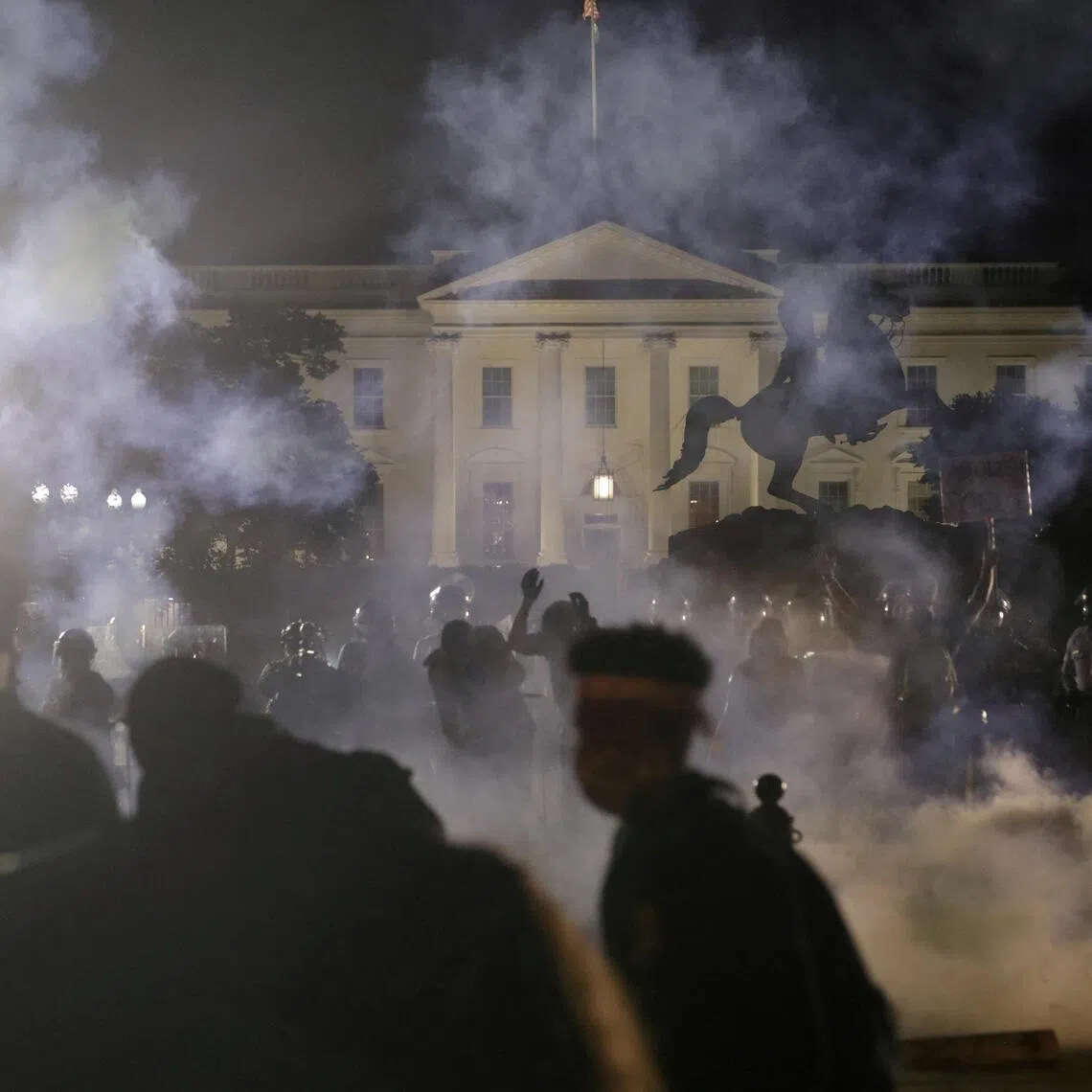 Protesters rally at the White House against the death in Minneapolis police custody of George Floyd, in Washington on May 31, 2020.  