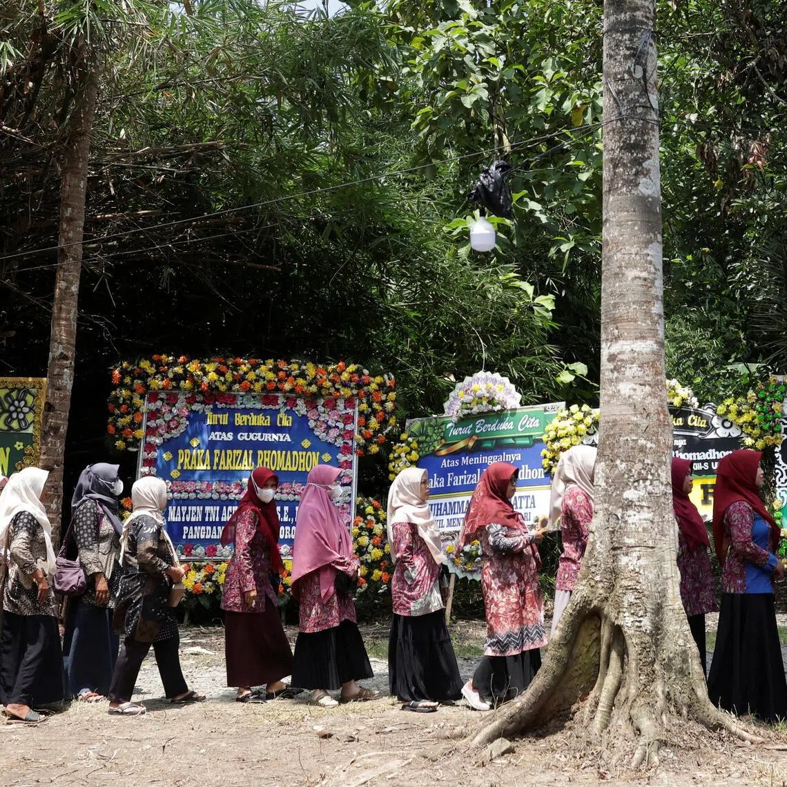 People stand in line to offer condolences for Praka Farizal Rhomadhon, a United Nations Interim Force in Lebanon (UNIFIL) peacekeeper killed in a strike on March 29 in southern Lebanon, at his parents' house in Kulon Progo regency, Yogyakarta, Indonesia, April 1, 2026.