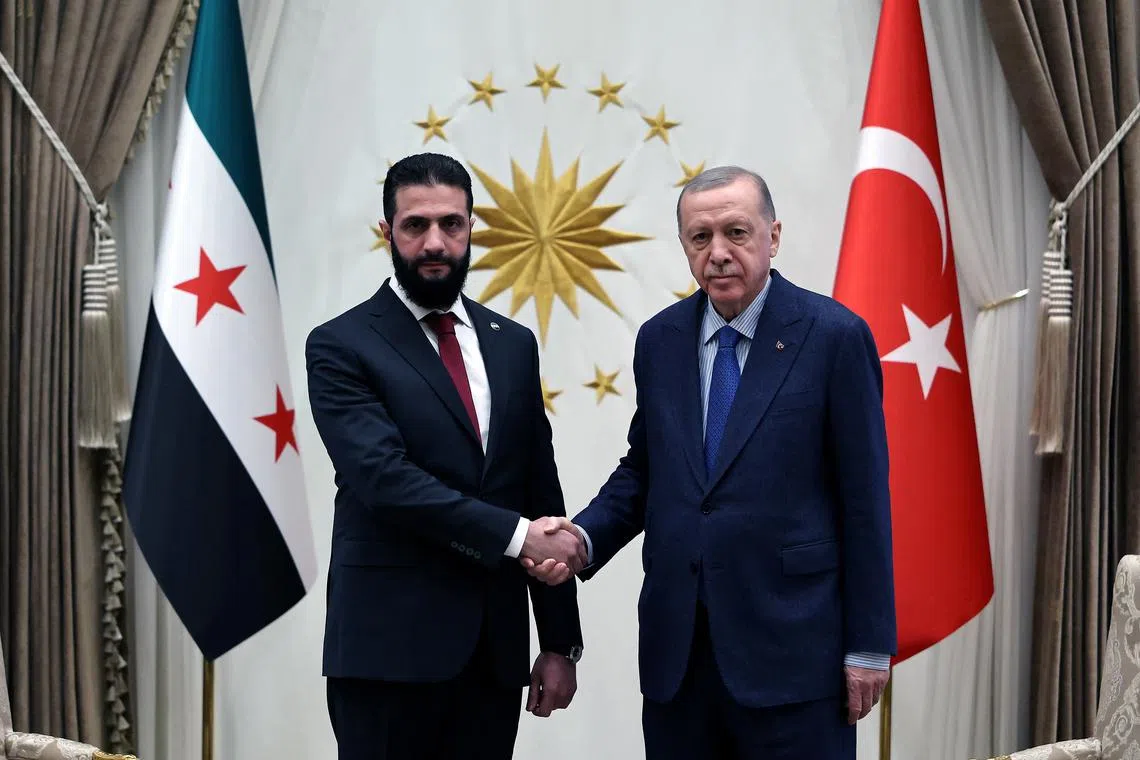 Syria's newly appointed president for a transitional phase Ahmed al-Sharaa meets with Turkey's President Tayyip Erdogan at the Presidential Palace in Ankara, Turkey, February 4, 2025. Murat Cetinmuhurdar/PPO/Handout via REUTERS
