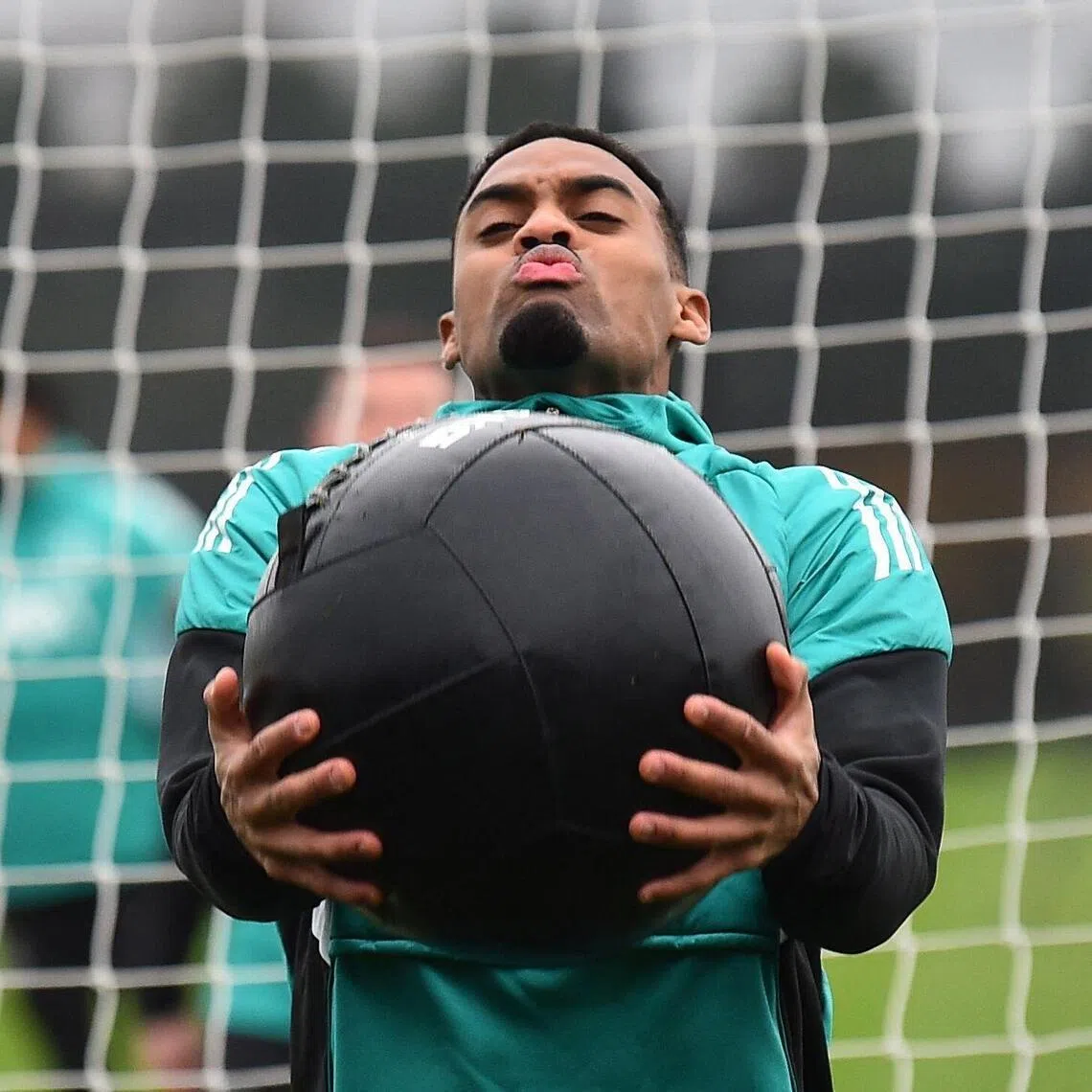 Liverpool's Dutch midfielder Ryan Gravenberch taking part in a team training session at their training ground in Kirkby on March 9, 2026, on the eve of their UEFA Champions League, last 16, first leg football match against Galatasaray. 