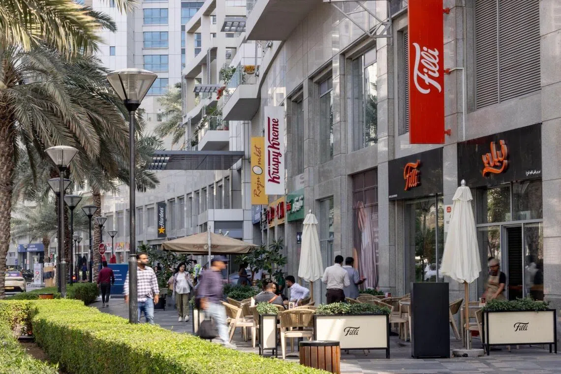 Shops and restaurants are open in Dubai and Abu Dhabi amid threats posed by drones and missiles from Iran.
