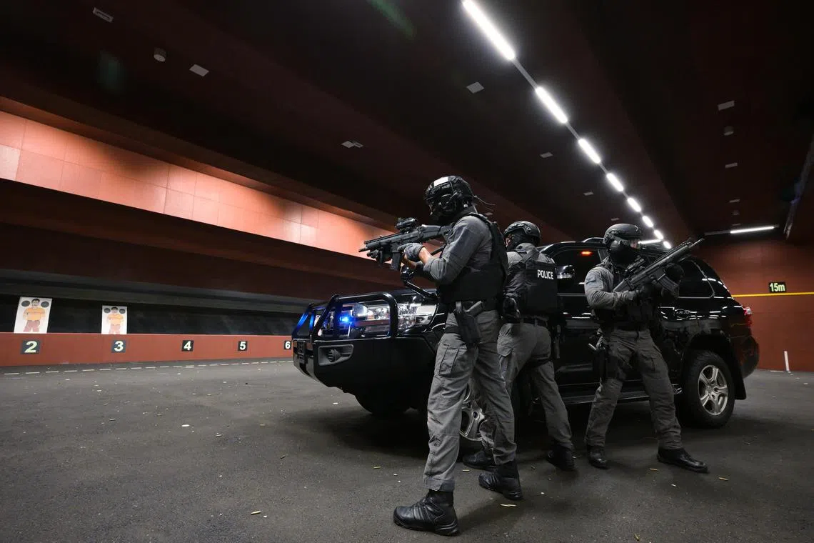 Personal security officers training at a ten lanes, 25 meters drive-in firing range at the new Police Security Command (SecCom) base.  