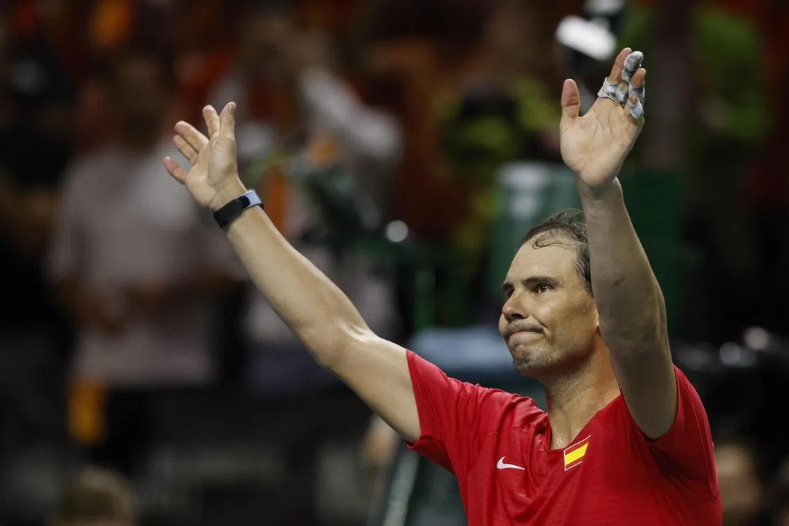 Spain's Rafael Nadal bids farewell to spectators after losing his match against Botic Van de Zandschulp of the Netherlands.