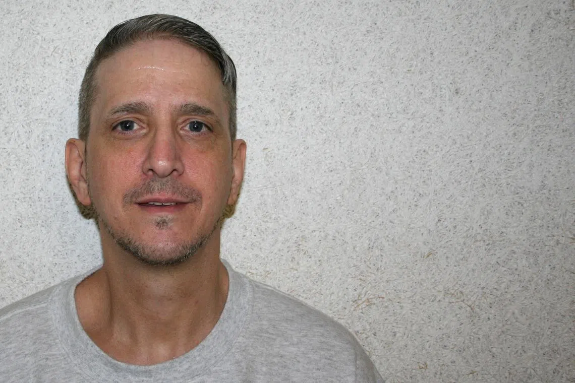 FILE PHOTO: Oklahoma death row inmate Richard Glossip, who is challenging his conviction in a 1997 murder-for-hire plot, poses for a photograph taken by his attorney in U.S., in 2016.   Don Knight/Handout via REUTERS/File Photo