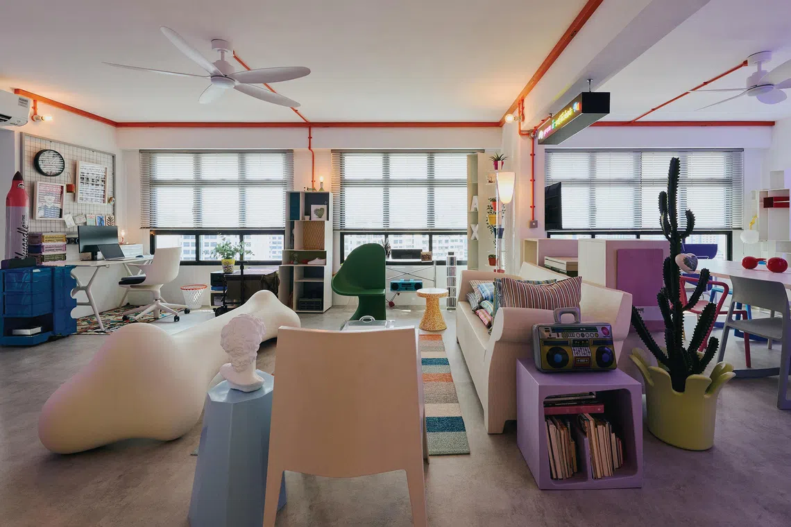 Cheerful colour and quirky collectibles bring life into this couple's four-room flat.