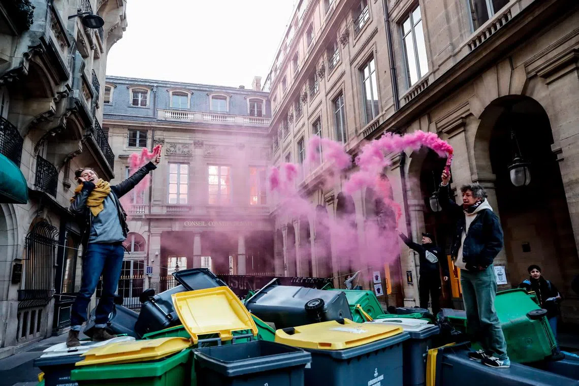 Activists during a protest against the French government's pension reform in Paris, France, on April 13, 2023. 
