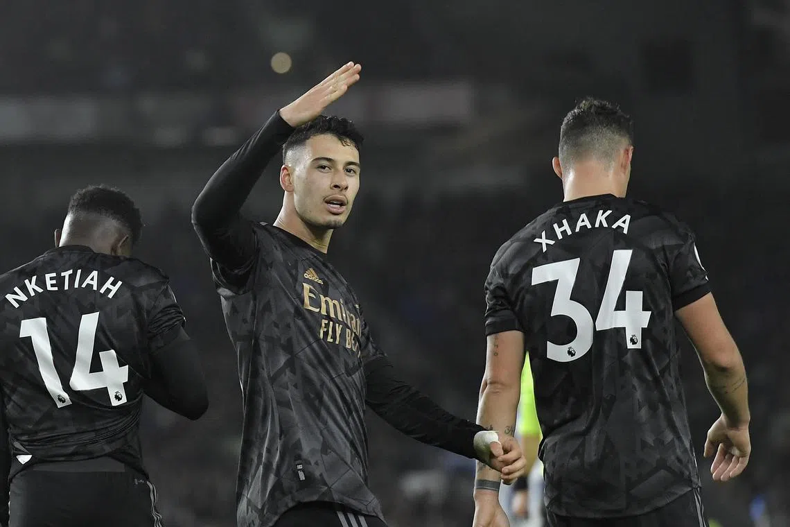 Gabriel Martinelli celebrates scoring a fourth goal for Arsenal.
