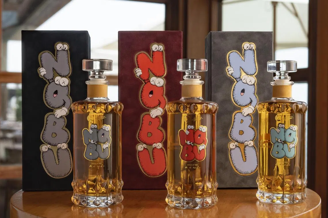 In an undated image provided by Qui Tequila, Qui TequilaÕs limited-edition collection with artwork created by the graffiti artist KAWS. Will labels and bottles designed by artists gin up enthusiasm among an increasingly abstinent generation? (Qui Tequila via The New York Times) Ñ  NO SALES; FOR EDITORIAL USE ONLY WITH NYT STORY ALCOHOL BRANDS ARTISTS BY MAX BERLINGER FOR NOV. 11, 2024. ALL OTHER USE PROHIBITED. Ñ