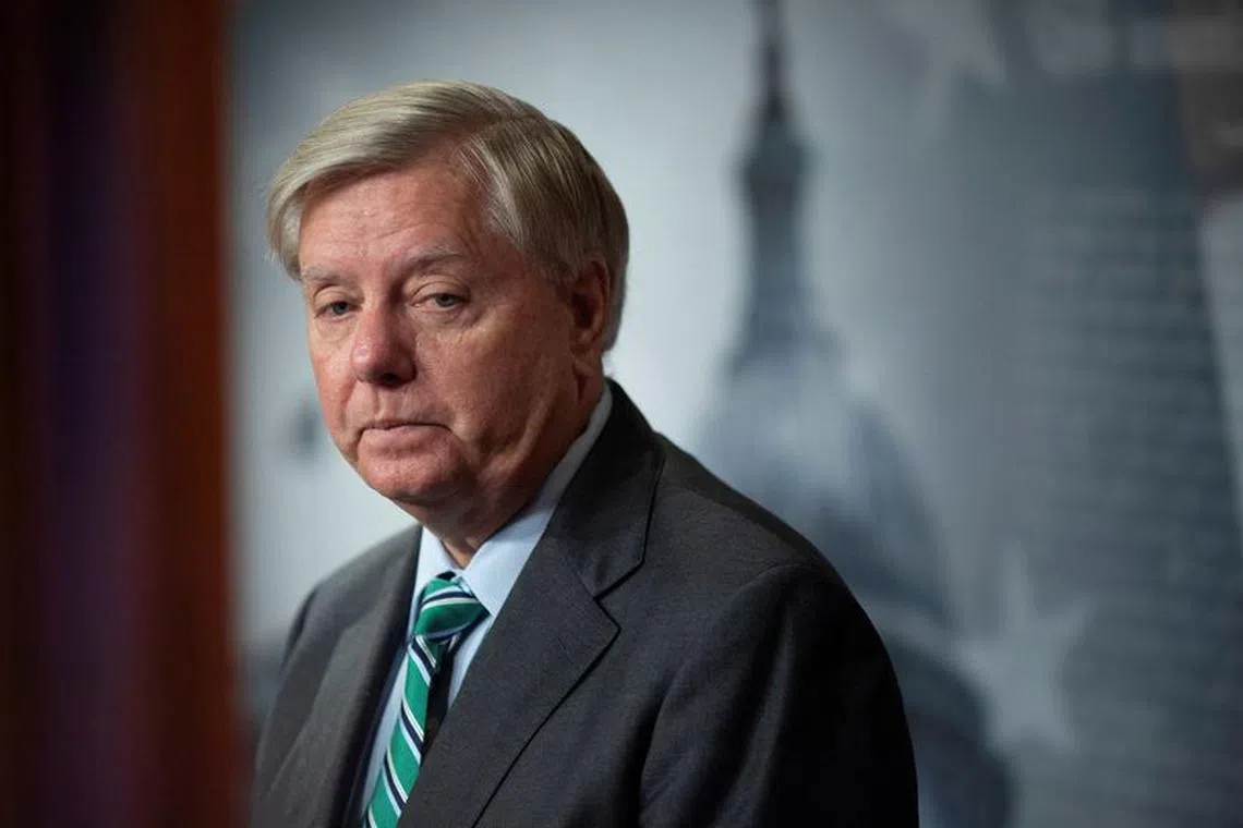FILE PHOTO: U.S. Senator Lindsey Graham (R-S.C.) looks on during a news conference on Capitol Hill, in Washington, U.S., September 14, 2022. REUTERS/Tom Brenner/File Photo