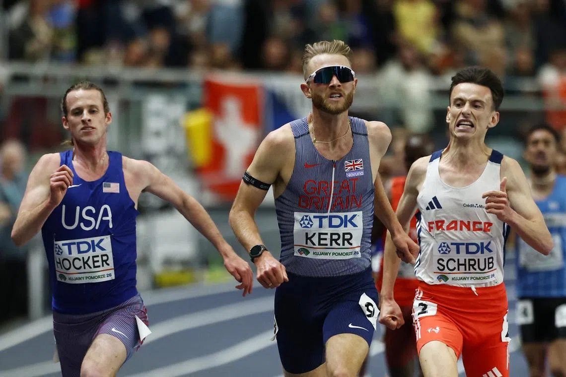 Athletics - World Indoor Championships - Kujawsko-Pomorska Arena, Torun, Poland - March 21, 2026 Britain's Josh Kerr, Cole Hocker of the U.S. and France's Yann Schrub in action during the men's 3000m final REUTERS/Kacper Pempel