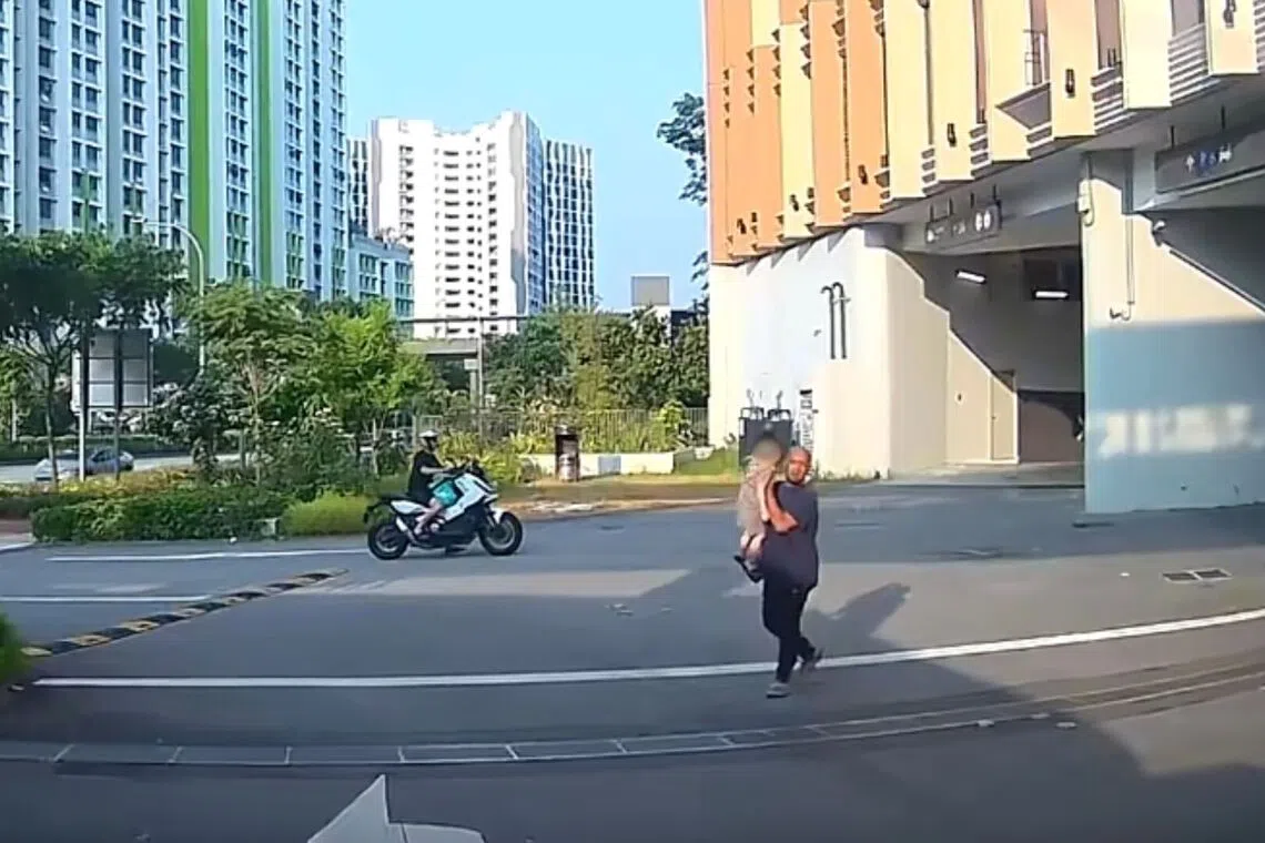 The child is seen in a video walking alone across a zebra crossing and heading to the road ahead.