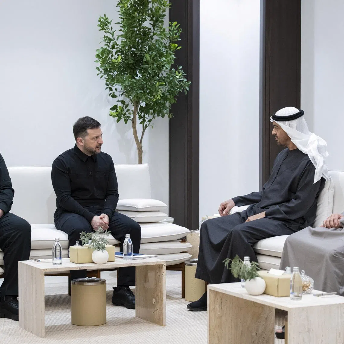 Sheikh Mohamed bin Zayed Al Nahyan, President of the United Arab Emirates, meets with Volodymyr Zelenskiy, President of Ukraine, as UAE Vice President and Deputy Prime Minister Sheikh Mansour bin Zayed Al Nahyan, and Secretary of the National Security and Defence Council of Ukraine, Rustem Umerov look on, in the United Arab Emirates in this undated handout picture released March 28, 2026. Abdulla Al Neyadi/ UAE Presidential Court/Handout via REUTERS