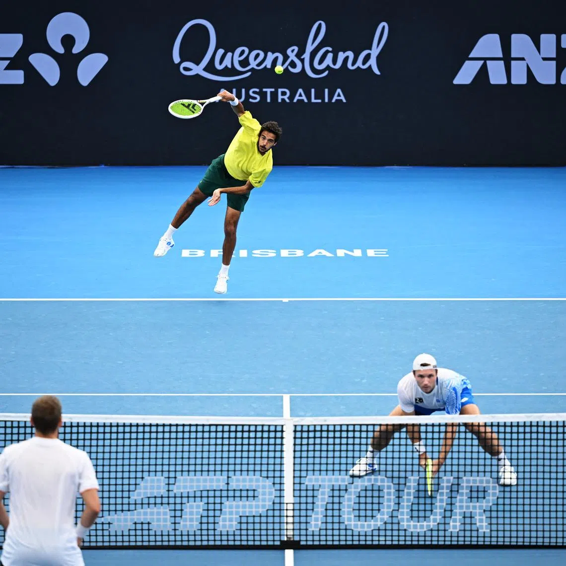 Tennis - Brisbane International Tennis Tournament - Pat Rafter Arena, Brisbane, Australia - January 11, 2026 Portugal's Francisco Cabral and Austria's Lucas Miedler in action during their men's doubles final against Britain's Julian Cash and Britain's Lloyd Glasspool REUTERS/Dan Peled