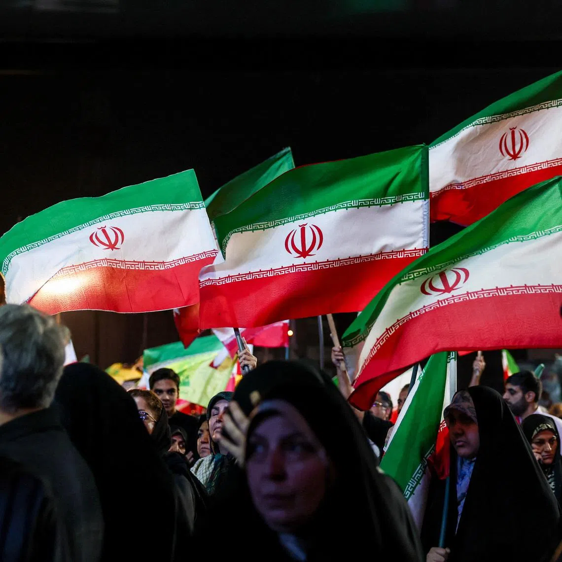 People wave Iranian flags during a rally in Tehran, Iran, May 29, 2026. Majid Asgaripour/WANA (West Asia News Agency) via REUTERS