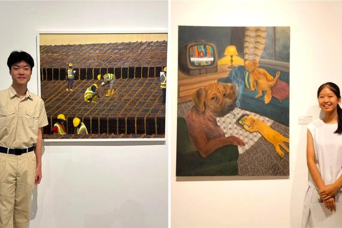 Students (from left) Yang Yiduo and Lorraine Wong with their paintings