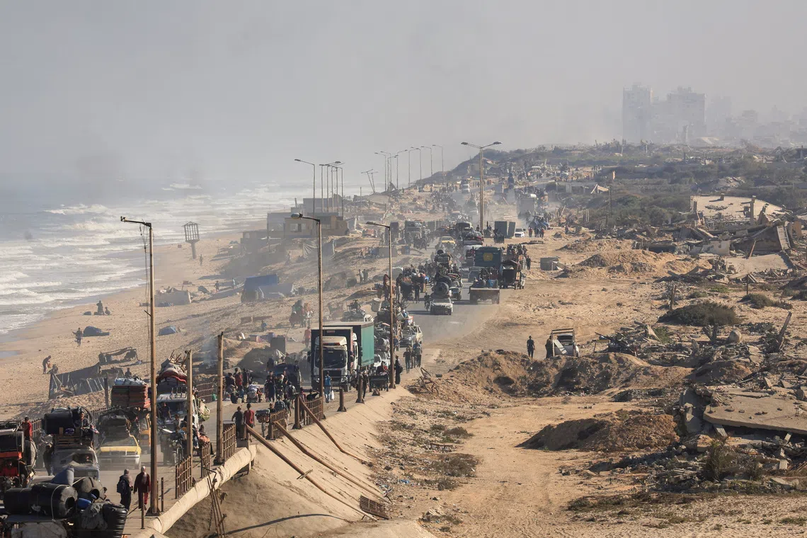 Displaced Palestinians moving southwards in the central Gaza Strip on Sept 20 after Israeli forces ordered residents of Gaza City to evacuate.
