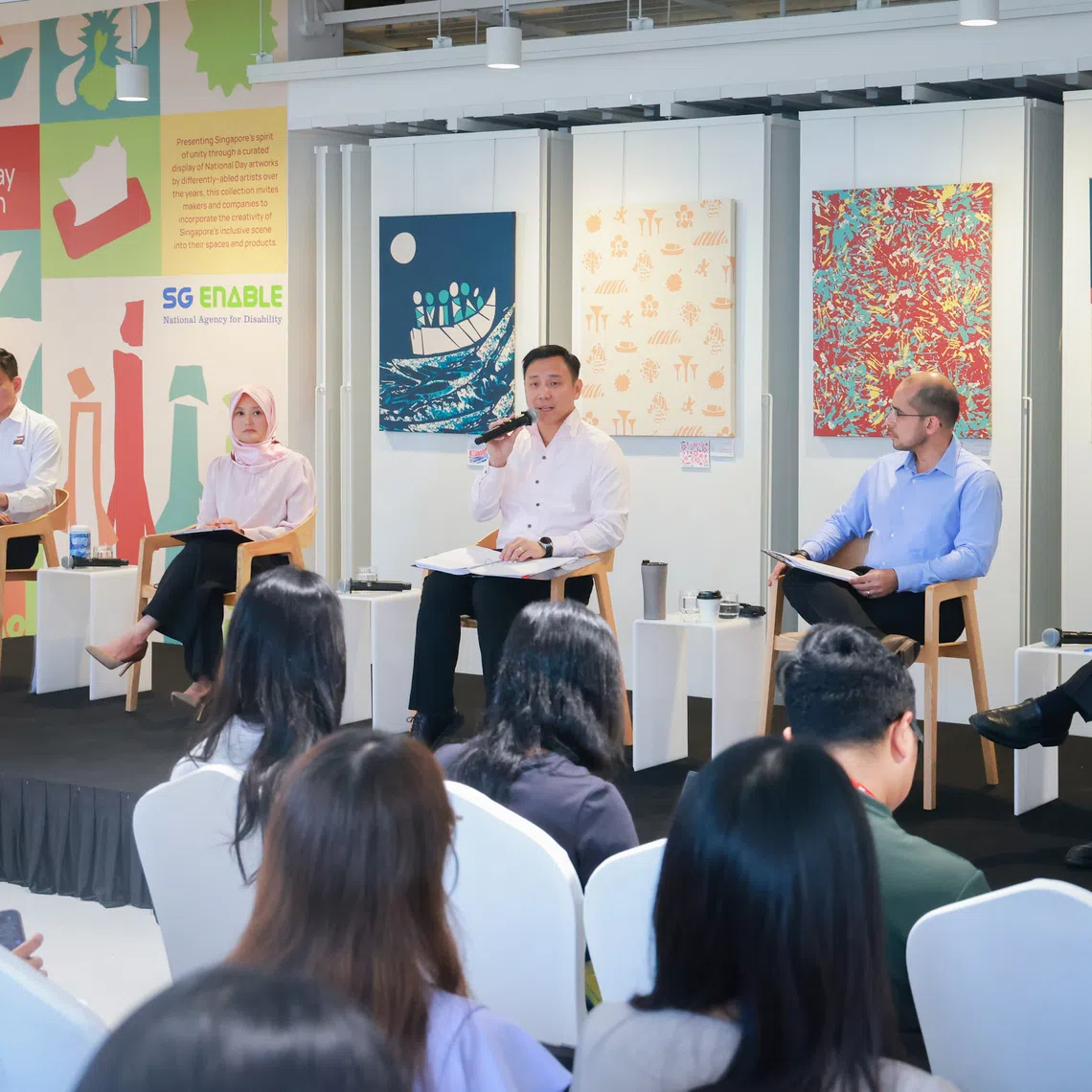 Senior Minister of State for Social and Family Development Goh Pei Ming (centre, on stage), leads the task force which announced on Oct 4 efforts to help people with disabilities live in the community.
