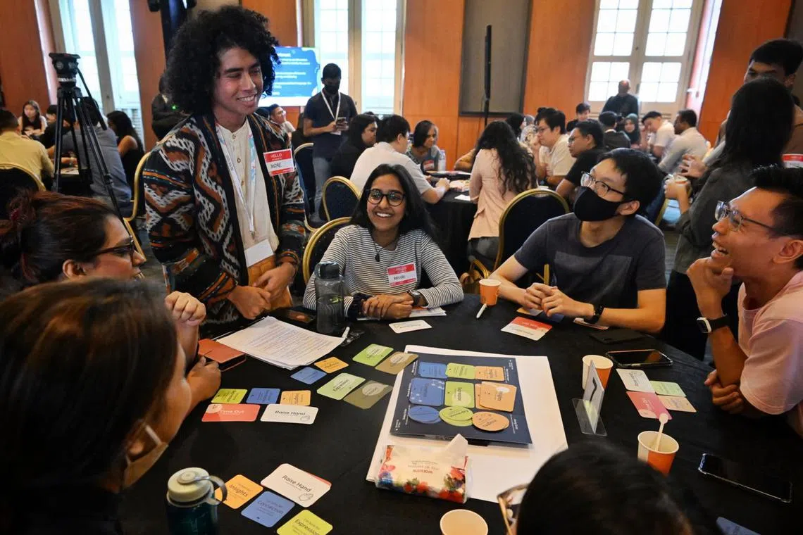Participants at a discussion during the launch of the National Youth Council's first civic conversations toolkit.
