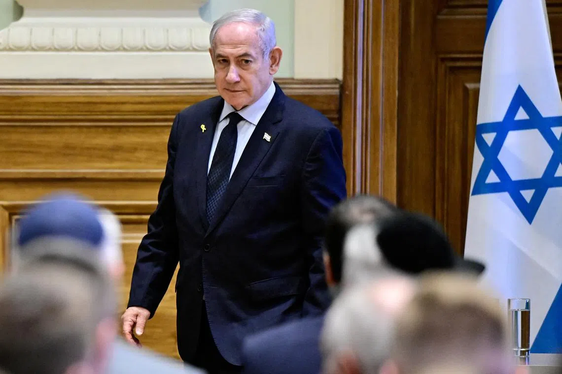 FILE PHOTO: Israeli Prime Minister Benjamin Netanyahu walks as he visits Ludovika University of Public Service in Budapest, Hungary, April 4, 2025. REUTERS/Marton Monus