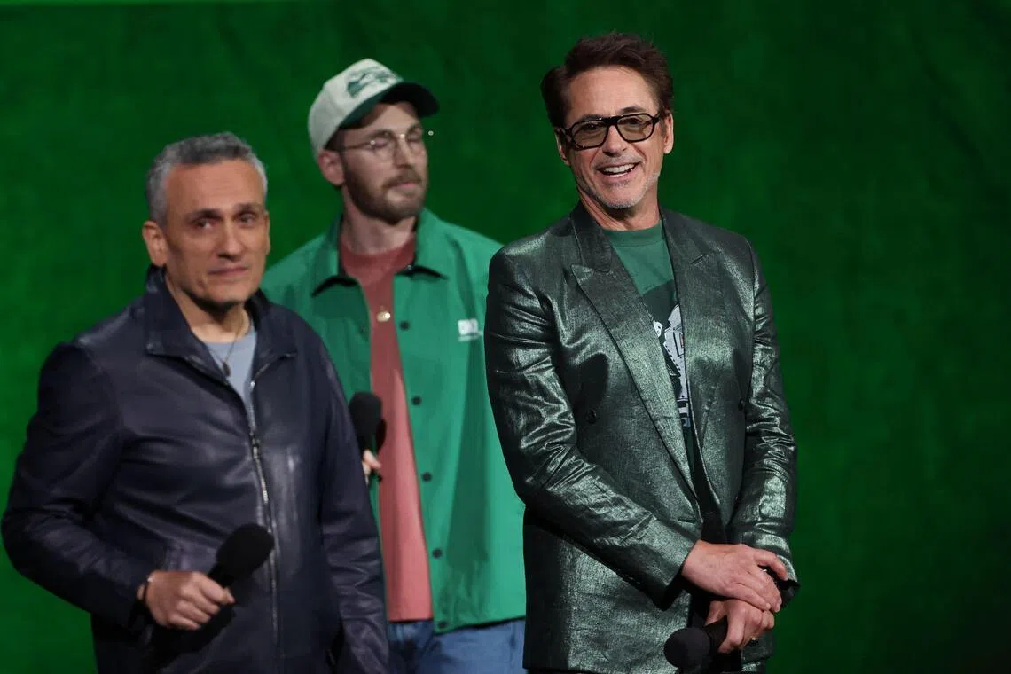 (From left) US filmmaker Joe Russo, actor Chris Evans and actor Robert Downey Jr promote Avengers: Doomsday at CinemaCon on April 16.