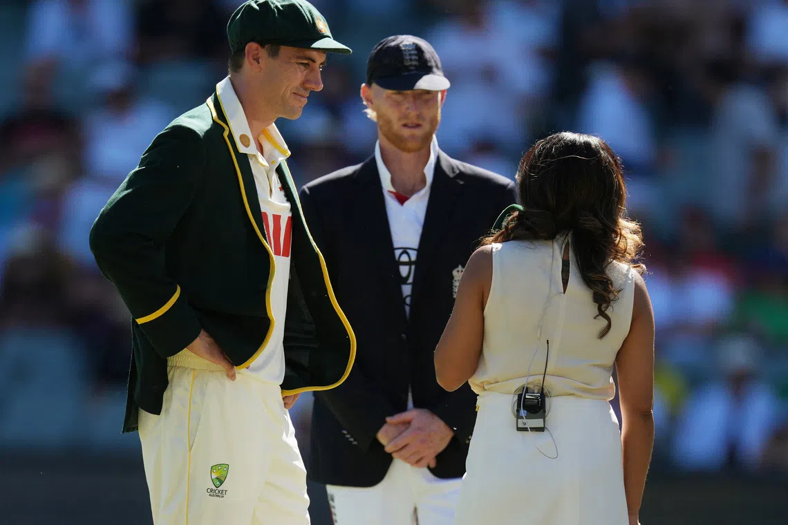 Cricket - The Ashes - Australia v England - Third Test - Adelaide Oval, Adelaide, Australia - December 17, 2025 Australia's Pat Cummins and England's Ben Stokes before the match REUTERS/Asanka Brendon Ratnayake