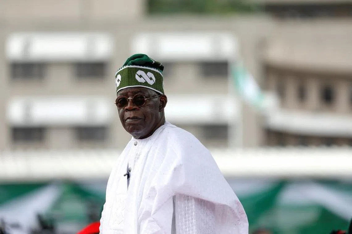 FILE PHOTO: Nigeria's President Bola Tinubu looks on after his swearing-in ceremony in Abuja, Nigeria May 29, 2023. REUTERS/Temilade Adelaja/File Photo