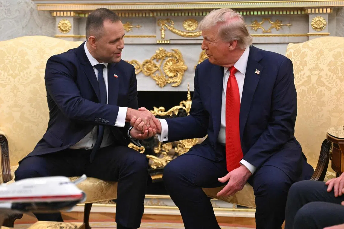 US President Donald Trump (right) welcoming Polish President Karol Nawrocki to the White House on Sept 3.