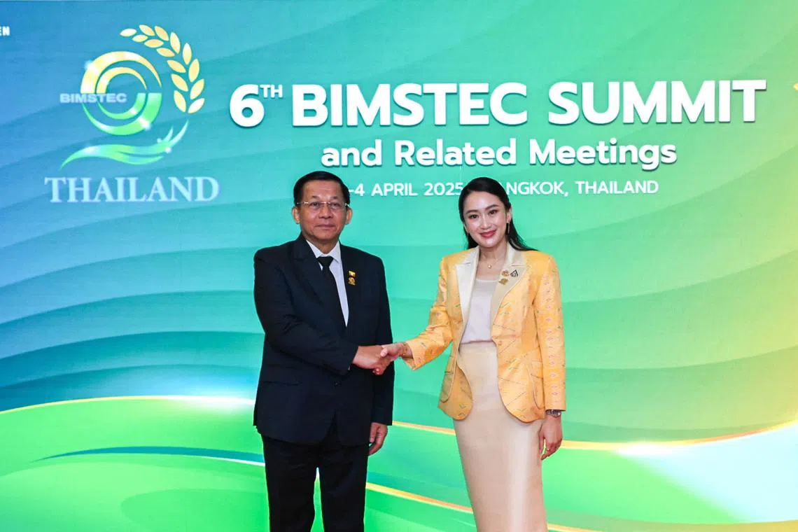 Myanmar's junta leader Min Aung Hlaing shakes hands with Thailand's Prime Minister Paetongtarn Shinawatra ahead of the 6th BIMSTEC Summit, in Bangkok, Thailand, April 4, 2025. Thailand Ministry of Foreign Affairs/Handout via REUTERS