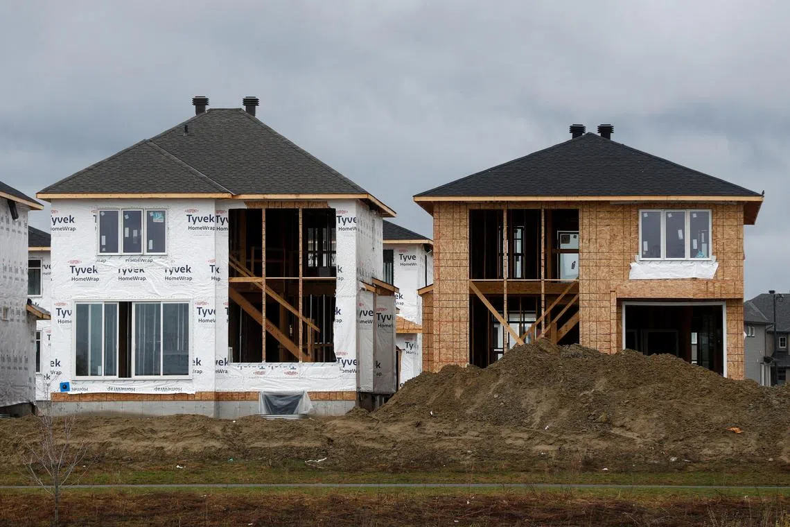FILE PHOTO: Houses are seen under construction in a neighbourhood of Ottawa, Ontario, Canada April 17, 2023.  REUTERS/Lars Hagberg/File Photo
