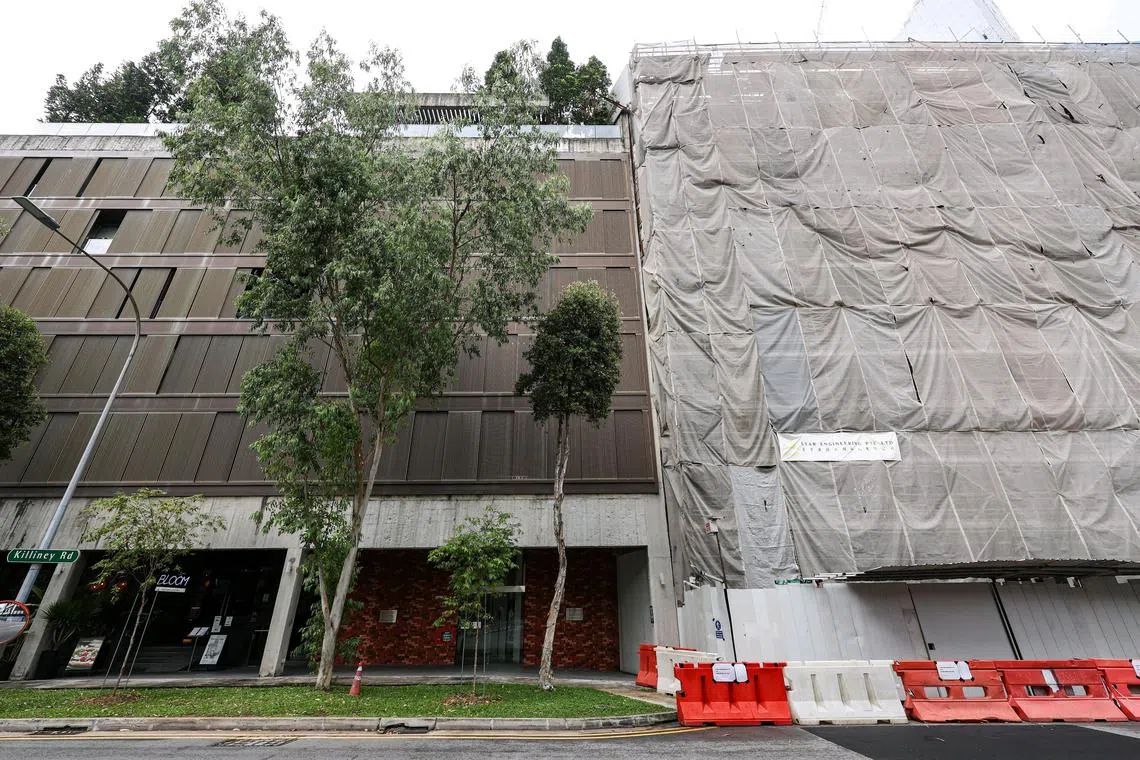 ST20241126_202484600473/jlkilliney/Brian Teo/Joyce Lim BH/(From Left) Exterior of Killiney 118 condominium and the adjacent 110/112 Killiney construction site on Nov 26, 2024. A hotel developer is seeking nearly $6 million in damages from the condo owners of Killiney 118 over an alleged encroachment onto its property. ST PHOTO: BRIAN TEO