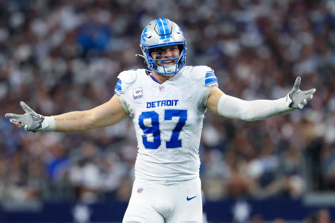 FILE PHOTO: Oct 13, 2024; Arlington, Texas, USA;  Detroit Lions defensive end Aidan Hutchinson (97) reacts during the second quarter against the Dallas Cowboys at AT&T Stadium. Mandatory Credit: Kevin Jairaj-Imagn Images/File Photo