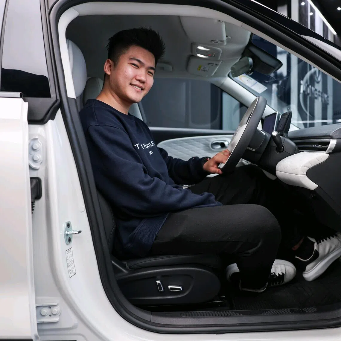 Mr Soh Ming, 28, founder and managing director of Volt Auto, at his company's showroom in Tai Seng.