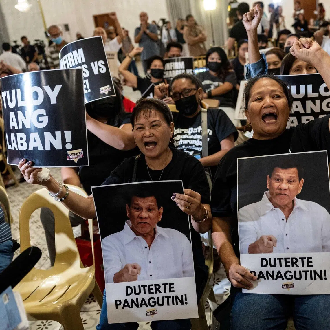 Relatives of those killed in former Philippine president Rodrigo Duterte’s deadly war on drugs pressing for justice in Quezon City on April 22.