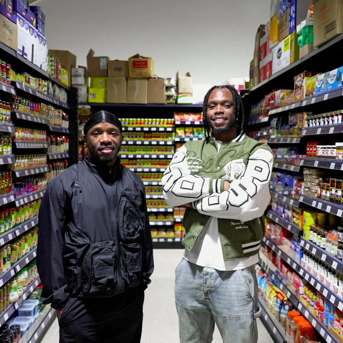 British rappers Krept and Konan stand in their new supermarket called Saveways that caters to ethnic minorities in Croydon, Britain, January 30, 2025. REUTERS/Marissa Davison