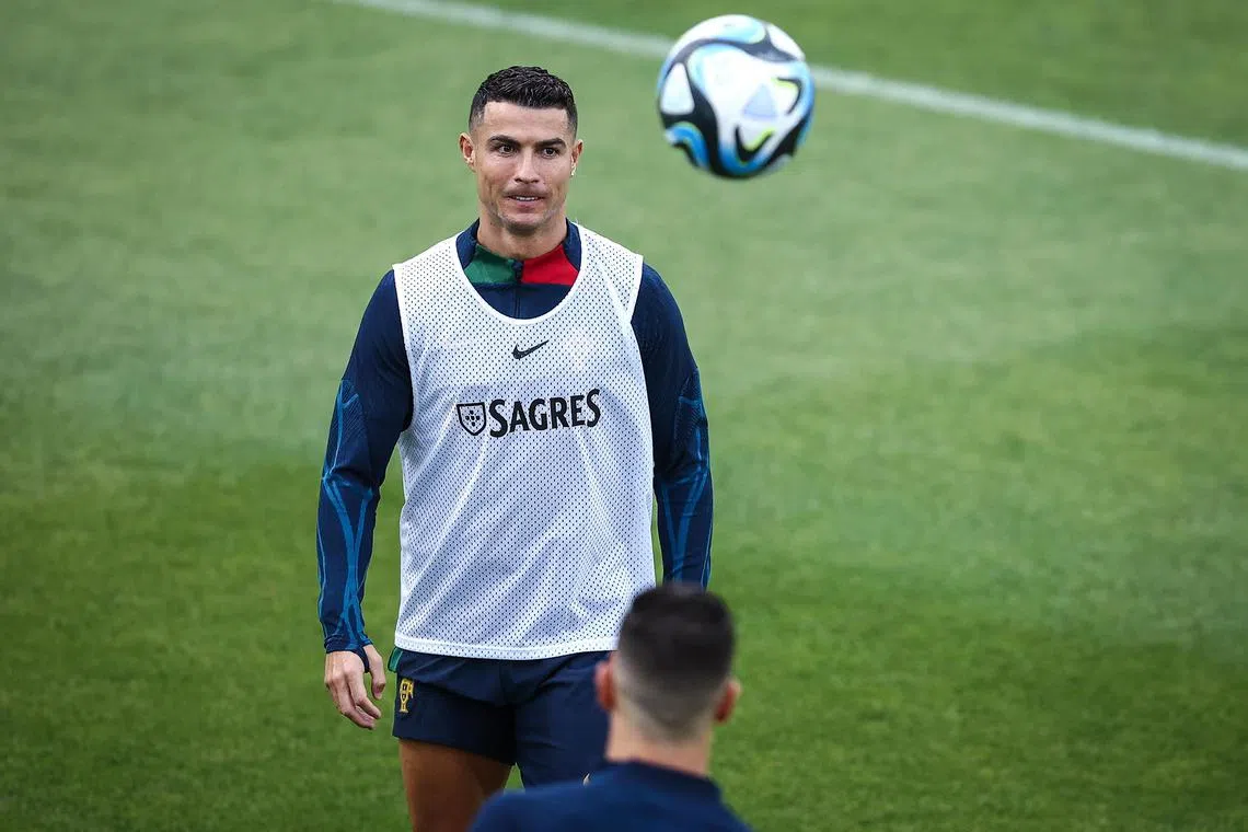 Ronaldo trains with the Portugese national team in Lisbon, after becoming .