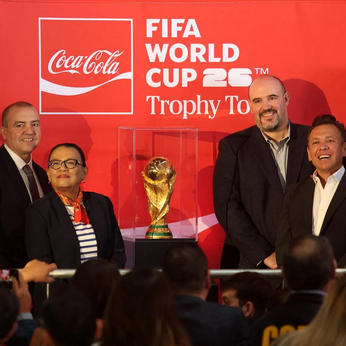 Soccer Football - FIFA World Cup - Trophy on display in Guadalajara - Akron Stadium, Guadalajara, Mexico - February 28, 2026 Former footballers Roque Junior and Hugo Sanchez, Director of Arca Continental Jean Claude Tissot, Secretary of the Interior of Mexico Rosa Icela Rodriguez Velazquez, Vice President and General Manager of the Coca-Cola Company Mexico North Carlos Ricalde Alcocer, Governor of Jalisco Pablo Lemus, and Mayor of Guadalajara Veronica Delgadillo pose with the FIFA World Cup trophy REUTERS/Michelle Freyria