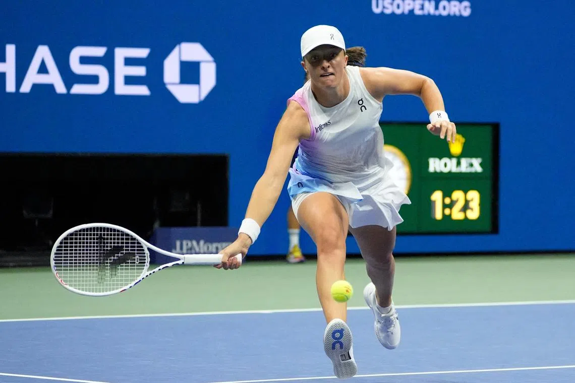 Aug 31, 2024; Flushing, NY, USA;  Iga Swiatek (POL) hits to Anastasia Pavlyuchenkova on day six of the 2024 U.S. Open tennis tournament at USTA Billie Jean King National Tennis Center. Mandatory Credit: Robert Deutsch-USA TODAY Sports