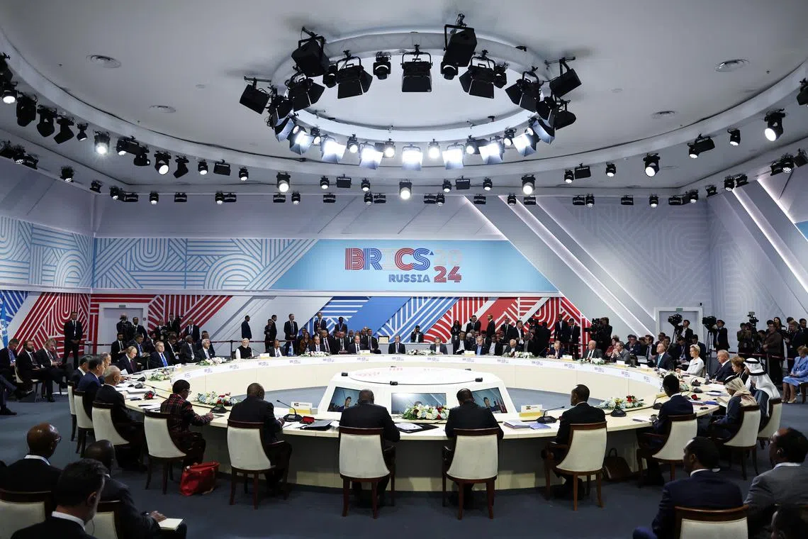 Officials attend a plenary session of the BRICS 2024 summit in Kazan, Russia October 23, 2024. Sputnik/Alexander Kazakov/Pool via REUTERS
