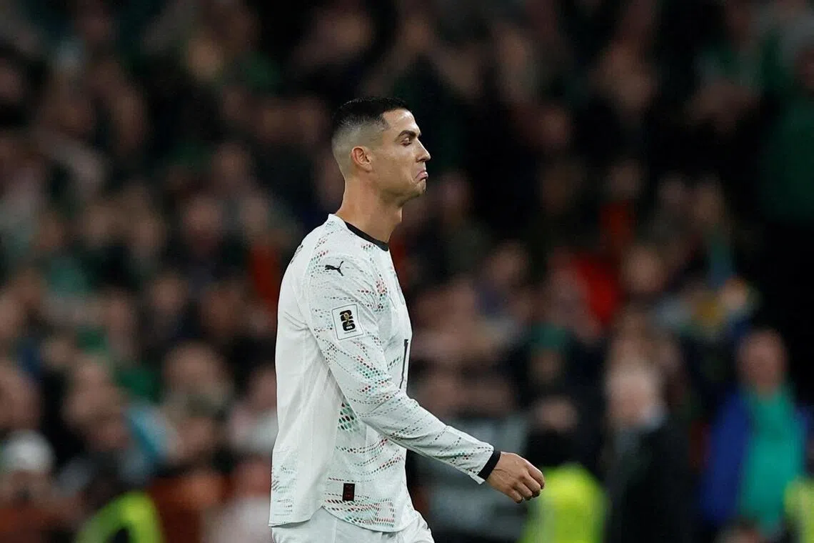 Portugal's Cristiano Ronaldo walking off after being shown a red card during the World Cup qualifier against the Republic of Ireland in Dublin on Nov 13. 