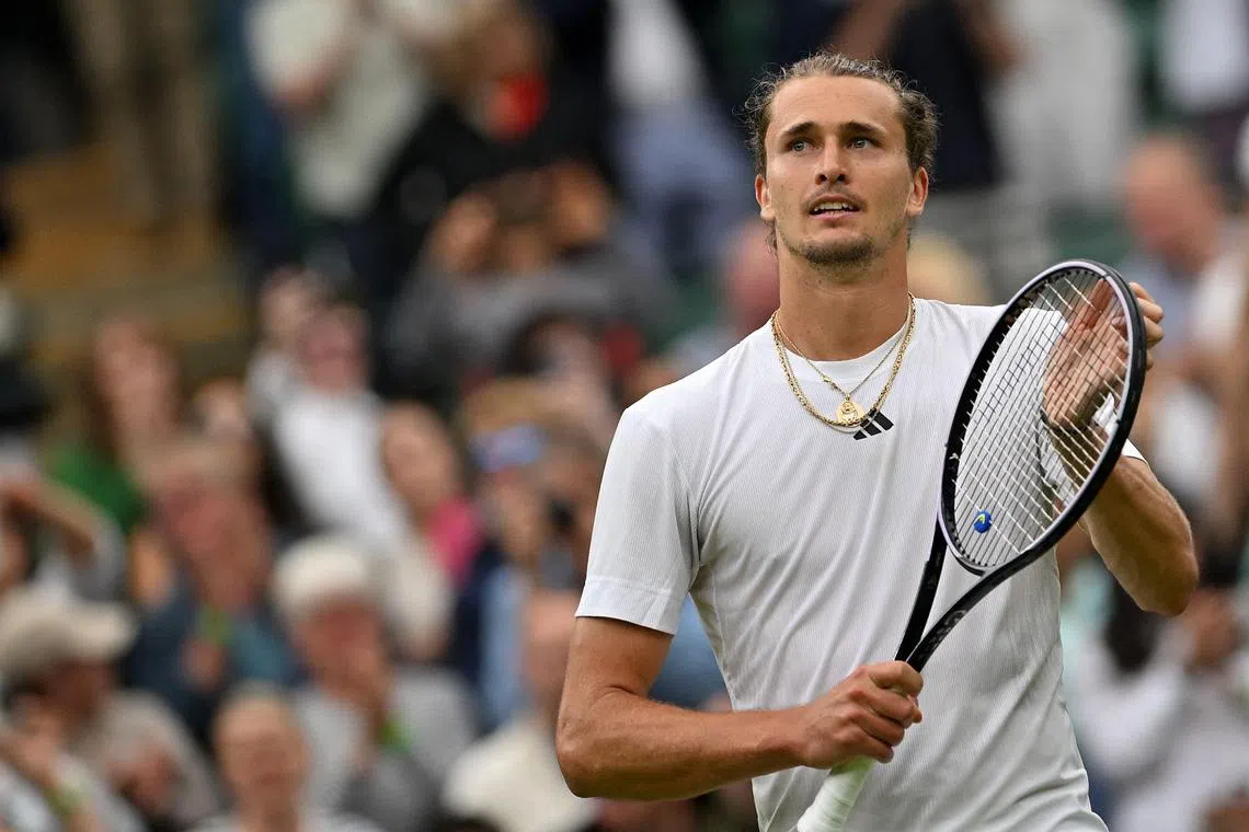 Germany's Alexander Zverev celebrates winning against Spain's Roberto Carballes Baena.