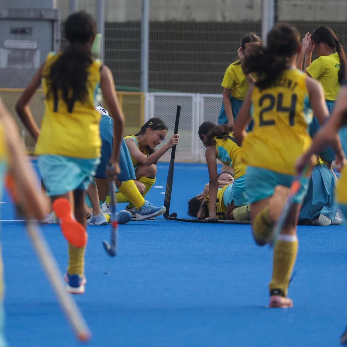 Players from Crescent Girls’ School celebrating after defeating Queensway Secondary School/Singapore Chinese Girls’ School combined team to win their sixth straight National School Games C Division girls’ hockey title at the Sengkang Hockey Stadium on Aug 25.