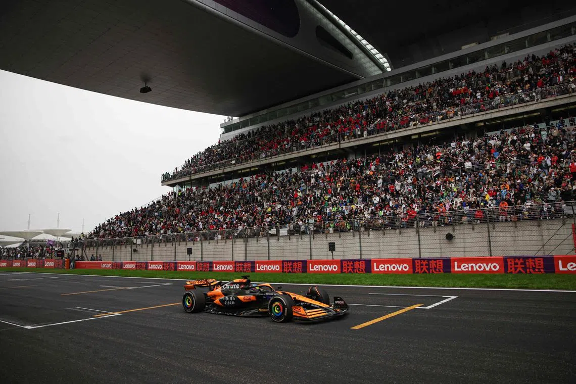 McLaren's Australian driver Oscar Piastri drives during the Formula One Chinese Grand Prix at the Shanghai International Circuit in Shanghai on April 21, 2024. (Photo by Andres Martinez Casares / POOL / AFP)